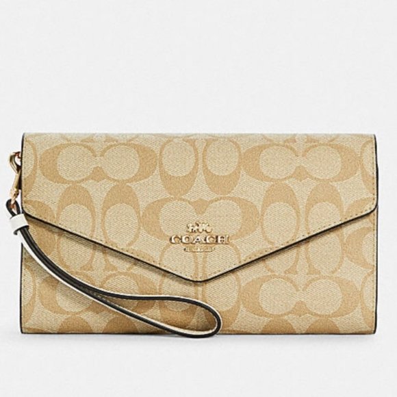 Coach Handbags - COACH Large Wallet In Signature Canvas